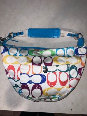 Coach Hamptons hobo bag featuring a multicolor scribble logo print